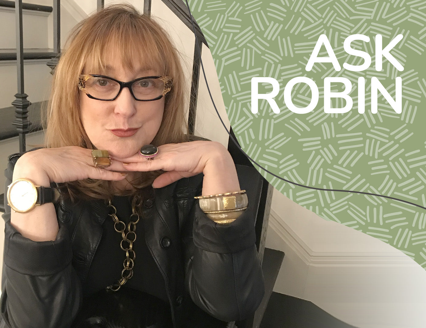 Image depicting Robin Baron with her head resting on her hands. Text reads: Ask Robin.