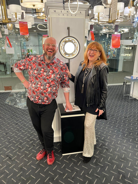 Robin Baron with Yudi Kaufman at the lighting showroom.