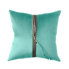 An Aqua pillow with graphite accent, featuring a long pull zipper down the middle.